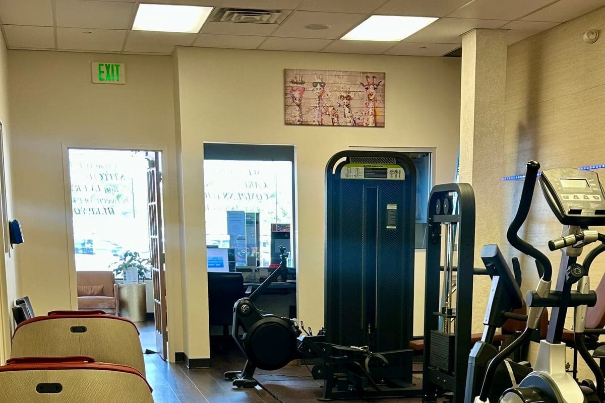 Reception and conditioning area with cardio and strength equipment